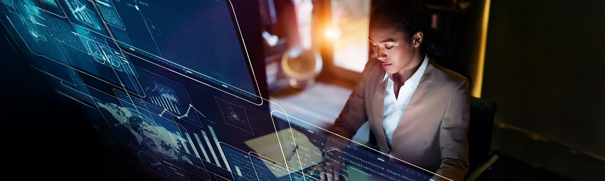 Female artificial intelligence professional working on laptop.